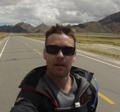 Christian Carthew Cycling on the  tour with redspokes
